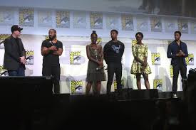 The Black Panther cast stands for an interview at Comic Con.