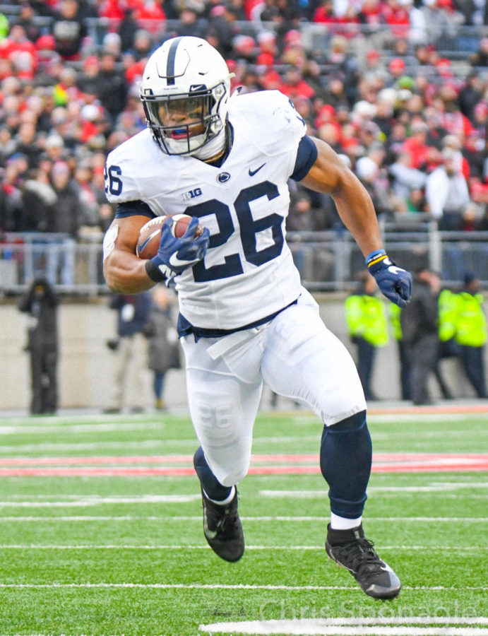 Potential first overall pick Saquon Barkley finds open space and runs for a touchdown against Ohio State. 