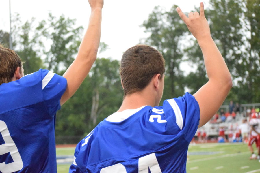 Senior Cory Hardesty signals plays to the Blue Jay offense Sept. 7, where the Blue Jays faced Warrenton. “It (football) made me feel involved,” Hardesty said. “I feel like I’ve contributed to helping other people too.” The senior football players will be recognized Oct. 19 at their last home game.