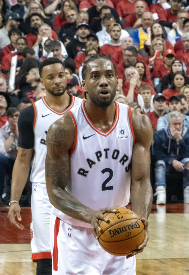 Kawhi Leonard, the Finals MVP, shoots a free throw in the 2019 NBA Finals. He was the star of the show in that series, helping the Toronto Raptors win their first NBA Championship. Leonard surprised the league when he signed with the LA Clippers in the off-season. 