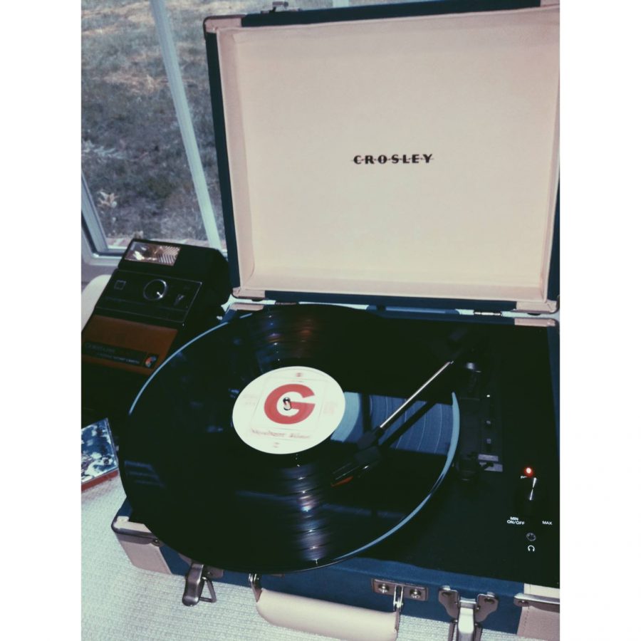 Artist Gerard Way's album "Hesitant Alien" on vinyl, on a new, but vintage-inspired Crosley turn table.