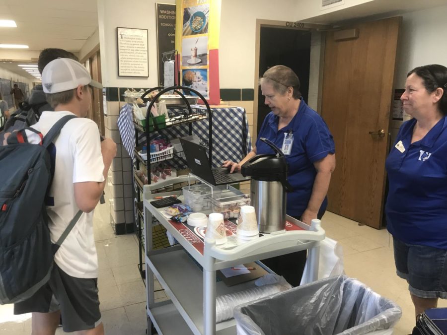 Cooks Jada Summer and Mary Ann Kassebaum serve breakfast to students before school Sept. 26. “They’re trying to get more kids to eat the breakfast to start off their day right,” cook Jada Summer said. “This way they have two locations to go to.” The FRAC states that children who increase their school breakfast participation make improvements in their math scores, attendance, punctuality, depression, anxiety and hyperactivity.