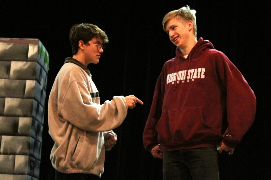 Junior Drew Post (left) and senior Ezra Miles (right) rehearse their lines at a theater practice Oct. 22 in the CJ Burger Fine Arts Center in preparation for their upcoming performances in “Guys and Dolls” as characters Nathan Detroit and Sky Masterson. "My favorite thing about Nathan is he's really quick on his feet, so if he's backed into a corner, he doesn't just give up," Post said. "He can really swindle people or come up with some sort of excuse." The theater program will be presenting “Guys and Dolls” from Nov. 8-10 at 7 p.m.