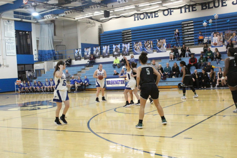 Lady Jays prepare to go on the offense during the varsity game against Fort Zumwalt Feb. 21. “It’s not about winning,” senior Nakya Kriebaum said, “and as long as we are doing our best and have fun, we’re good.” The Lady Jays lost the game 55-17.