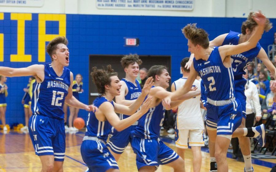 The Blue Jays celebrate their victory over Borgia on Friday, Nov. 29 at St. Francis Borgia High School.  "[The most exciting game] was probably my first game or the game against Borgia," junior forward Todd Bieg said. The Blue Jays are currently undefeated at 4-0.