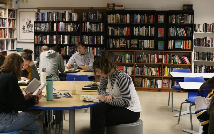 Students in English teacher Colin Flynn’s AP Seminar class read for 10 minutes during Book Love. “School has a way of making people not like reading,” Flynn said. “Taking notes over a book, having to write a report about it—all of those things kind of take the pleasure out of reading, so if you don’t love reading, you’re not going to read.” Book Love doesn’t involve tests or assignments over the books and helps students enjoy reading with books of their choice.