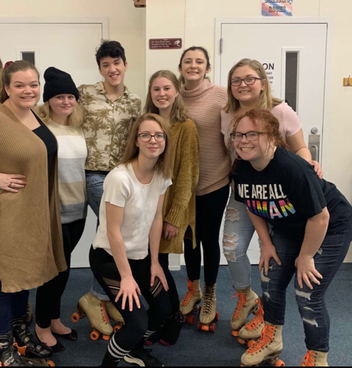 Senior Drew Post poses with fellow theater students. "Just to constantly watch all of us simultaneously have such a good time," Post said. He has been creating videos since he was young.