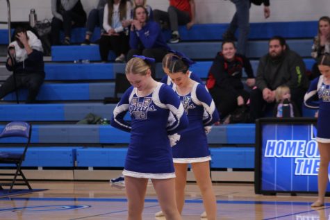 Jaywalkers junior dancers Isabella Fitzgerald and Gabrielle Ziglin pose before the start of their performance in the Big Blue Jay Gym on Wednesday, Jan. 5. "[Nationals] is such a big competition, but obviously we want to go, we want to do good and we want to maybe take something home," Ziglin said. The dance team will compete at national competition Feb. 18-20 and and their state competion on Sat. Feb. 26 at the Family Arena in St. Charles.