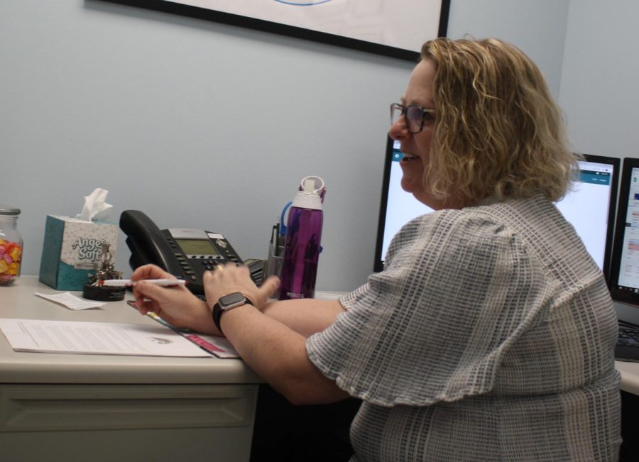 McGowan discusses college applications during a student meeting on Wednesday, Sept. 28. "My goal is that I do a minimum of two individual appointments with every senior in our building," McGowan said. She has worked as a guidance counselor for 18 years. 